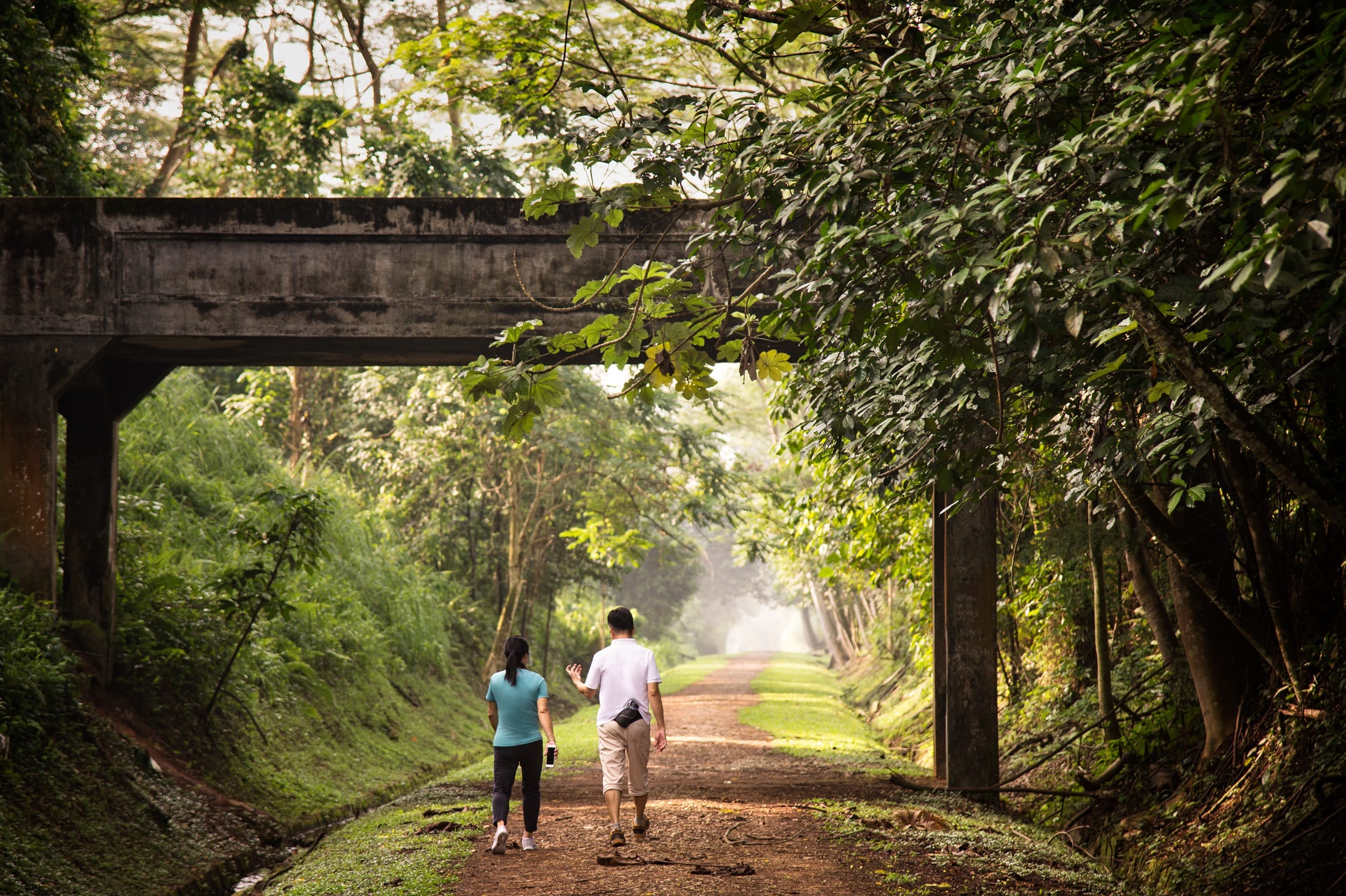 Photo of 2 persons walking along the Rail Corridor
